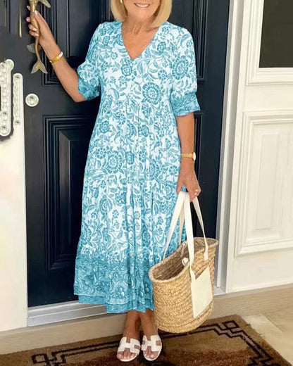 Manoli | Elegante vestido floral con cuello en V -